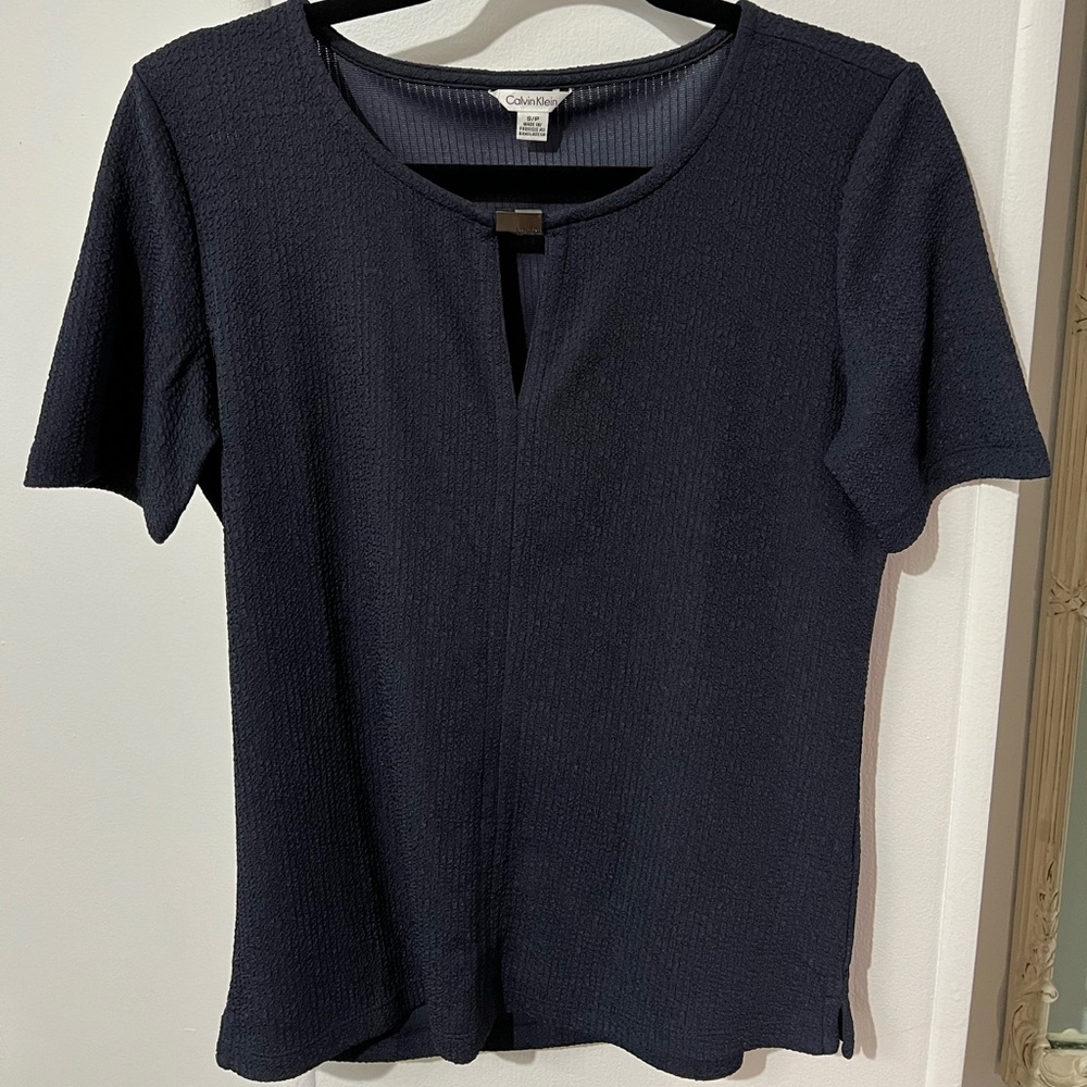Calvin Klein top. Size S. Navy blue. Very gently used.